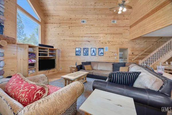 a bathroom with a sink double vanity and a mirror