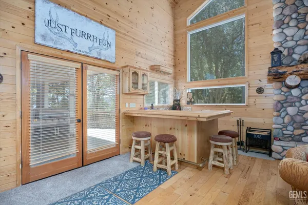 a view of a backyard with sitting area