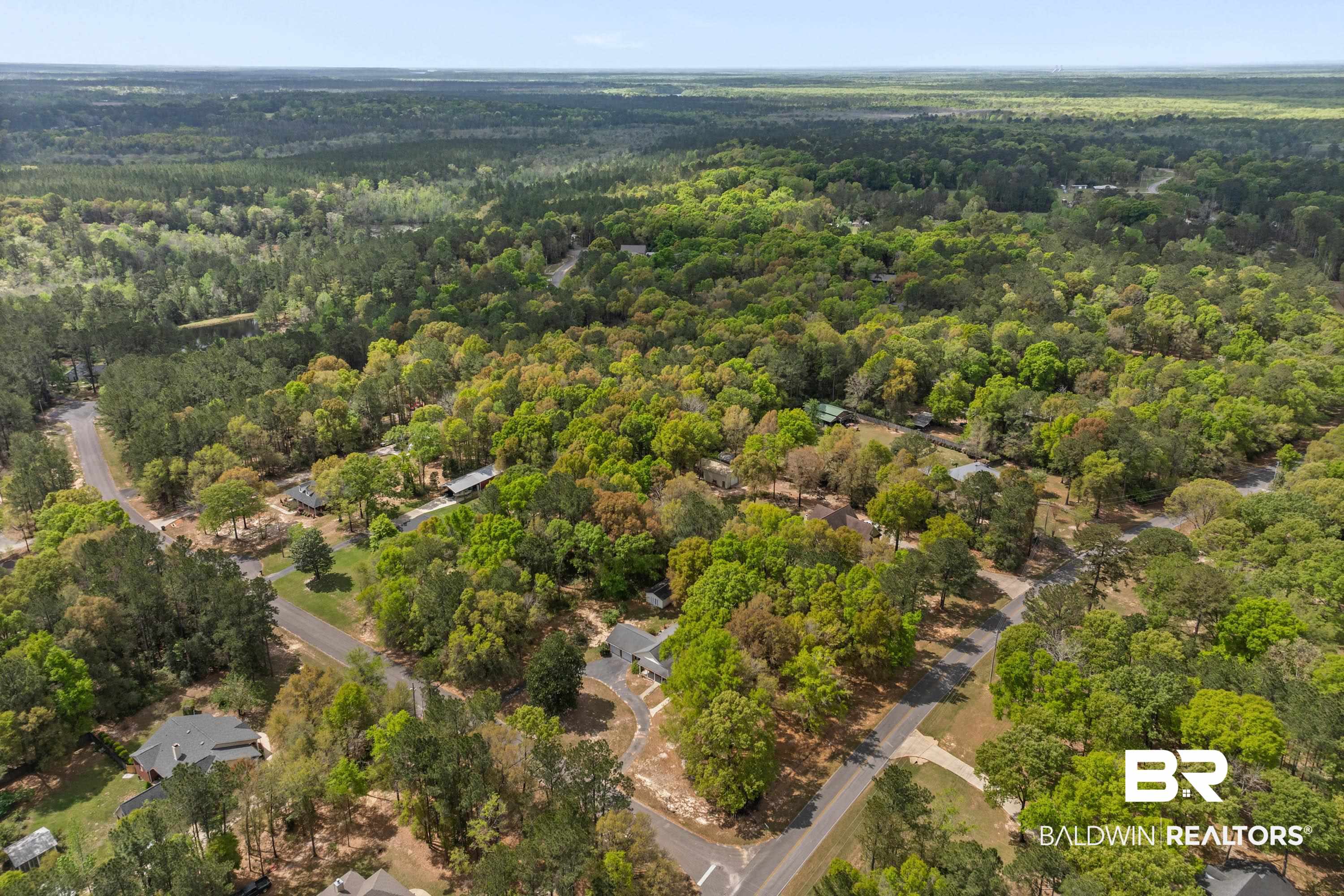 10140 Lakeview Road Bay Minette, AL 36507 - Photo 33 of 35 Drone / aerial view of a heavily wooded area
