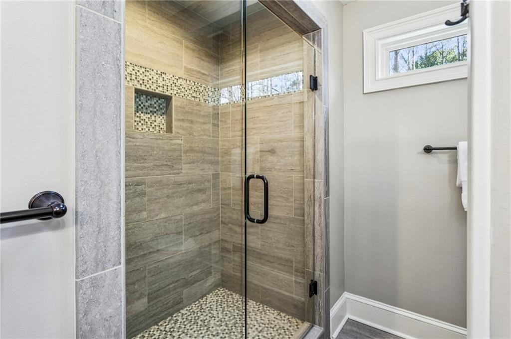 23 Midway Road Marietta, GA 30064 - Photo 13 of 32 a bathroom with a shower