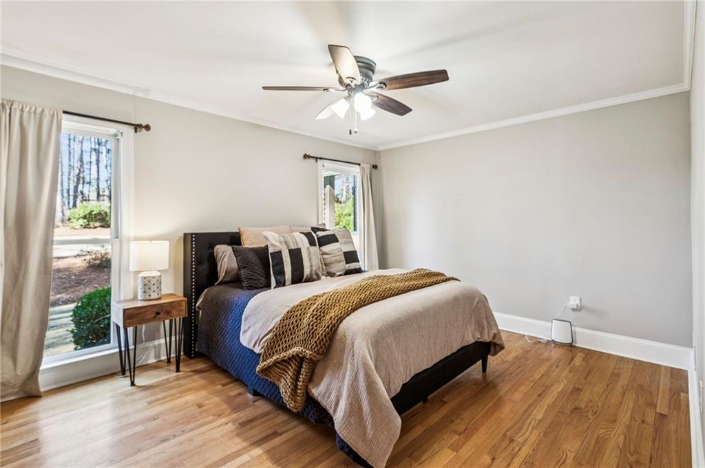 23 Midway Road Marietta, GA 30064 - Photo 14 of 32 a bed room with a bed and a window