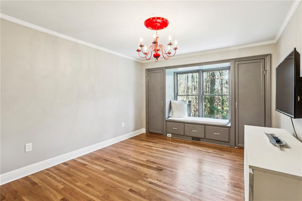 23 Midway Road Marietta, GA 30064 - Photo 16 of 32 a view of an empty room with a window and wooden floor