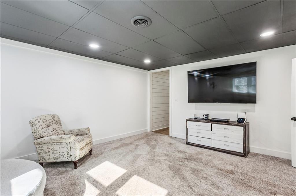23 Midway Road Marietta, GA 30064 - Photo 19 of 32 a living room with furniture and a flat screen tv