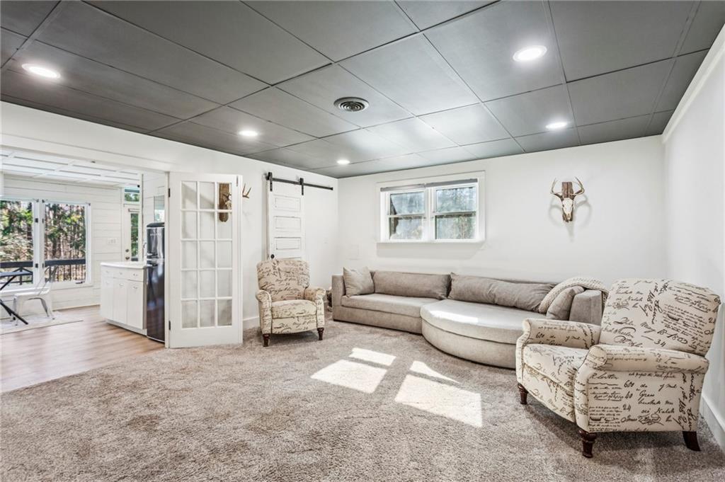23 Midway Road Marietta, GA 30064 - Photo 20 of 32 a living room with furniture and a large window