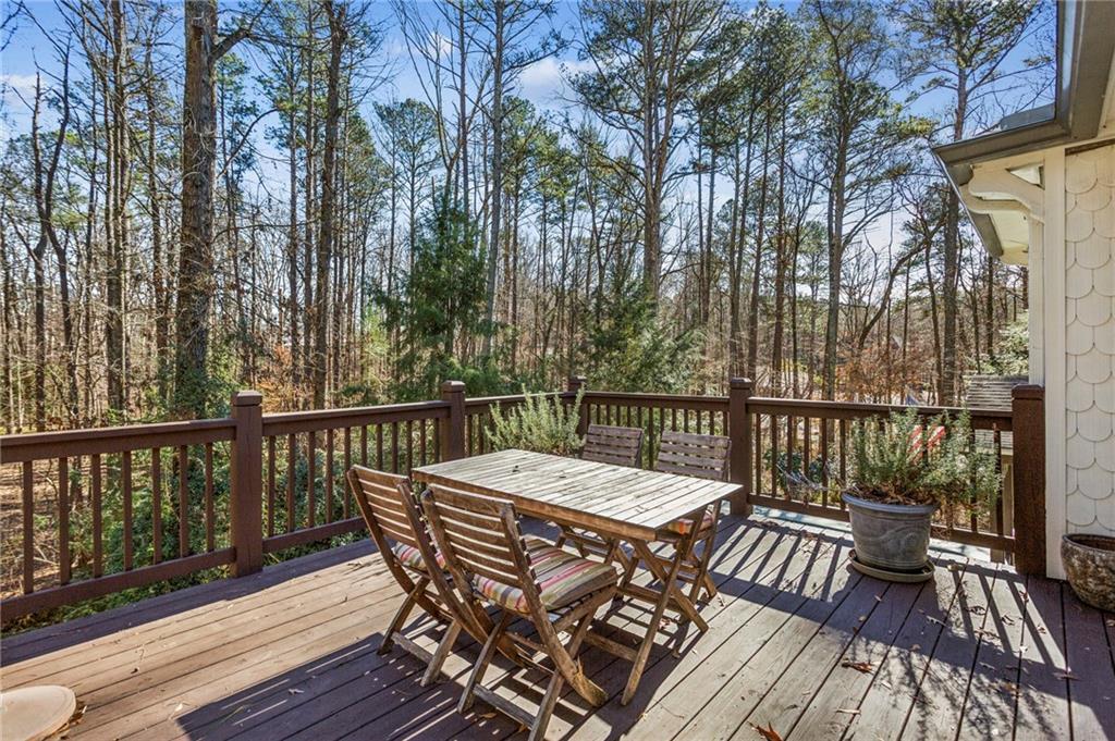 23 Midway Road Marietta, GA 30064 - Photo 23 of 32 a view of balcony with wooden floor and outdoor seating