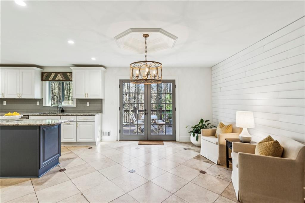 23 Midway Road Marietta, GA 30064 - Photo 5 of 32 a open kitchen with stainless steel appliances granite countertop a stove and a sink