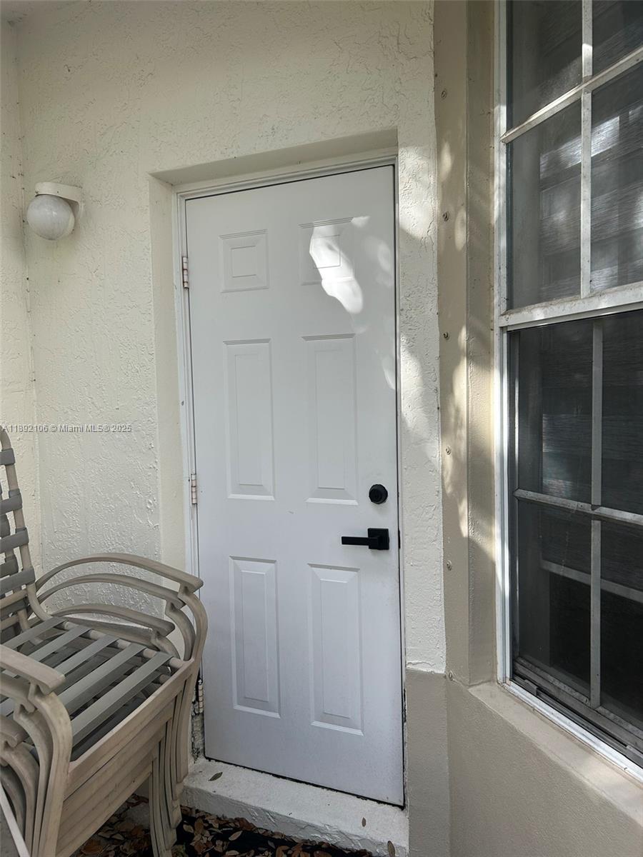 18730 Southwest 25th Court, Unit 18730 Miramar, FL 33029 - Photo 25 of 30 a bathroom with a granite countertop shower