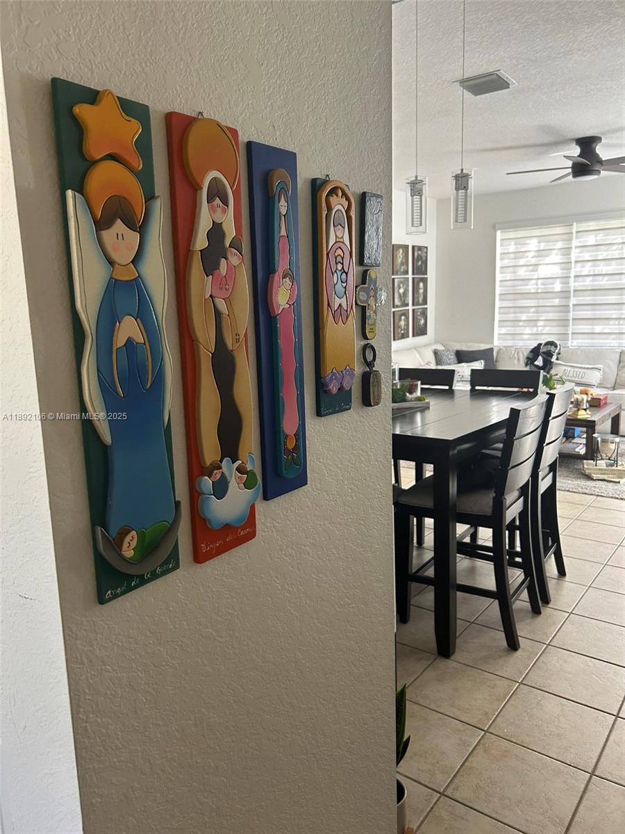 18730 Southwest 25th Court, Unit 18730 Miramar, FL 33029 - Photo 4 of 30 a view of a dining room with furniture