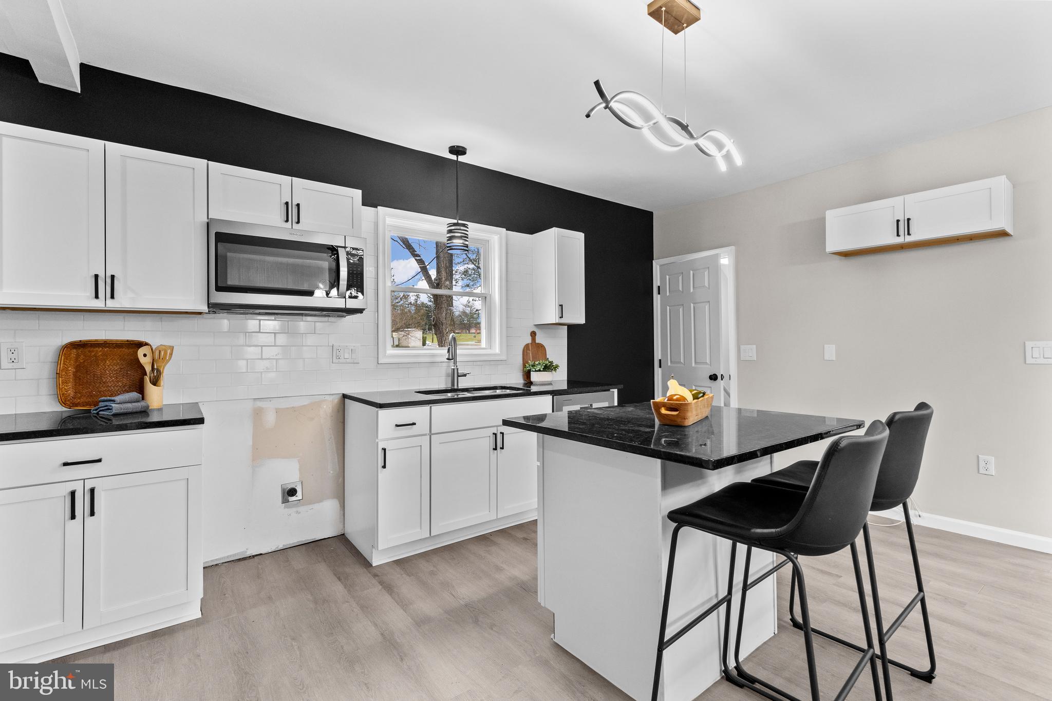 3507 Union Deposit Road Harrisburg, PA 17109 - Photo 14 of 37 a kitchen with stainless steel appliances kitchen island granite countertop a sink and cabinets