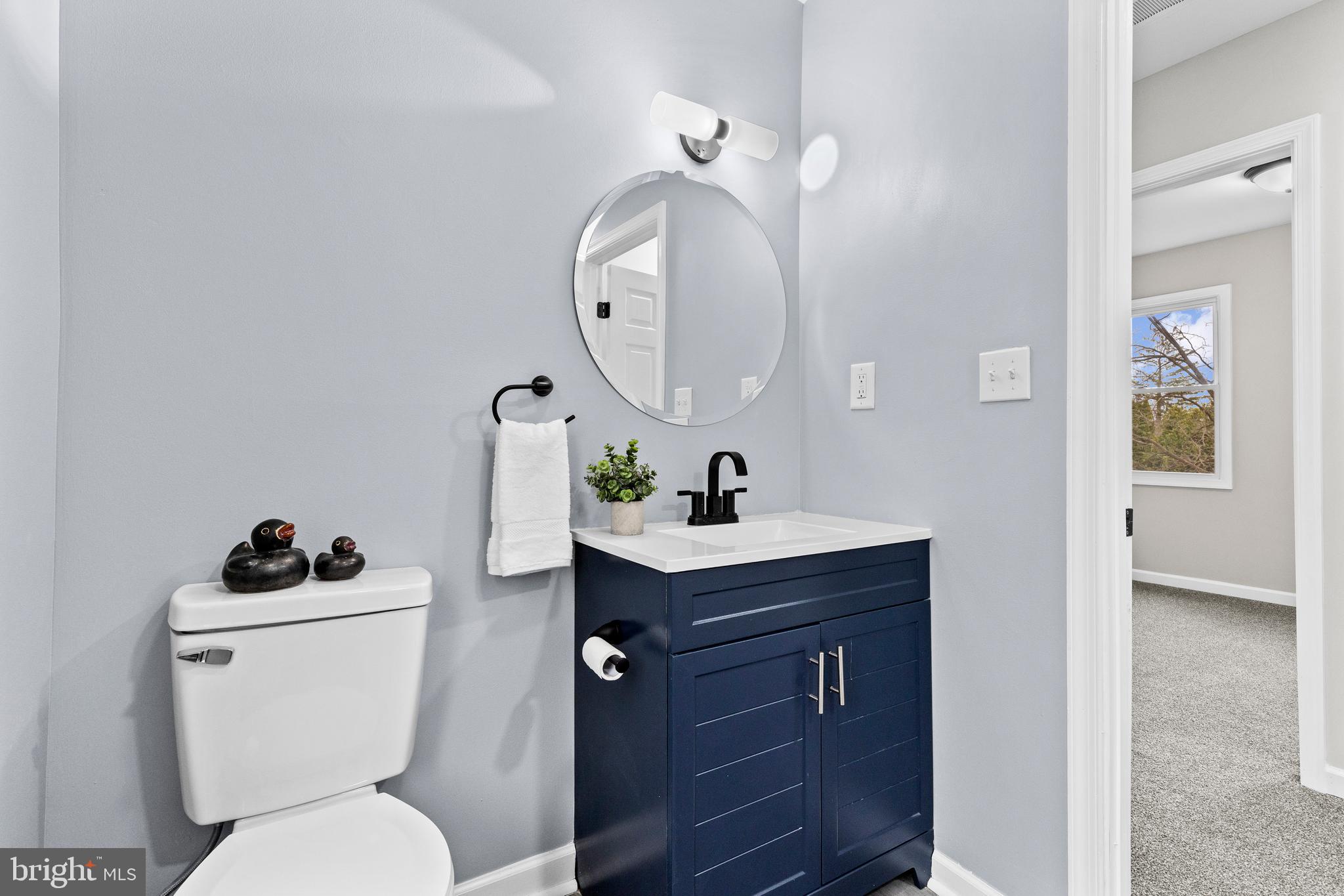 3507 Union Deposit Road Harrisburg, PA 17109 - Photo 21 of 37 a bathroom with a toilet sink and mirror
