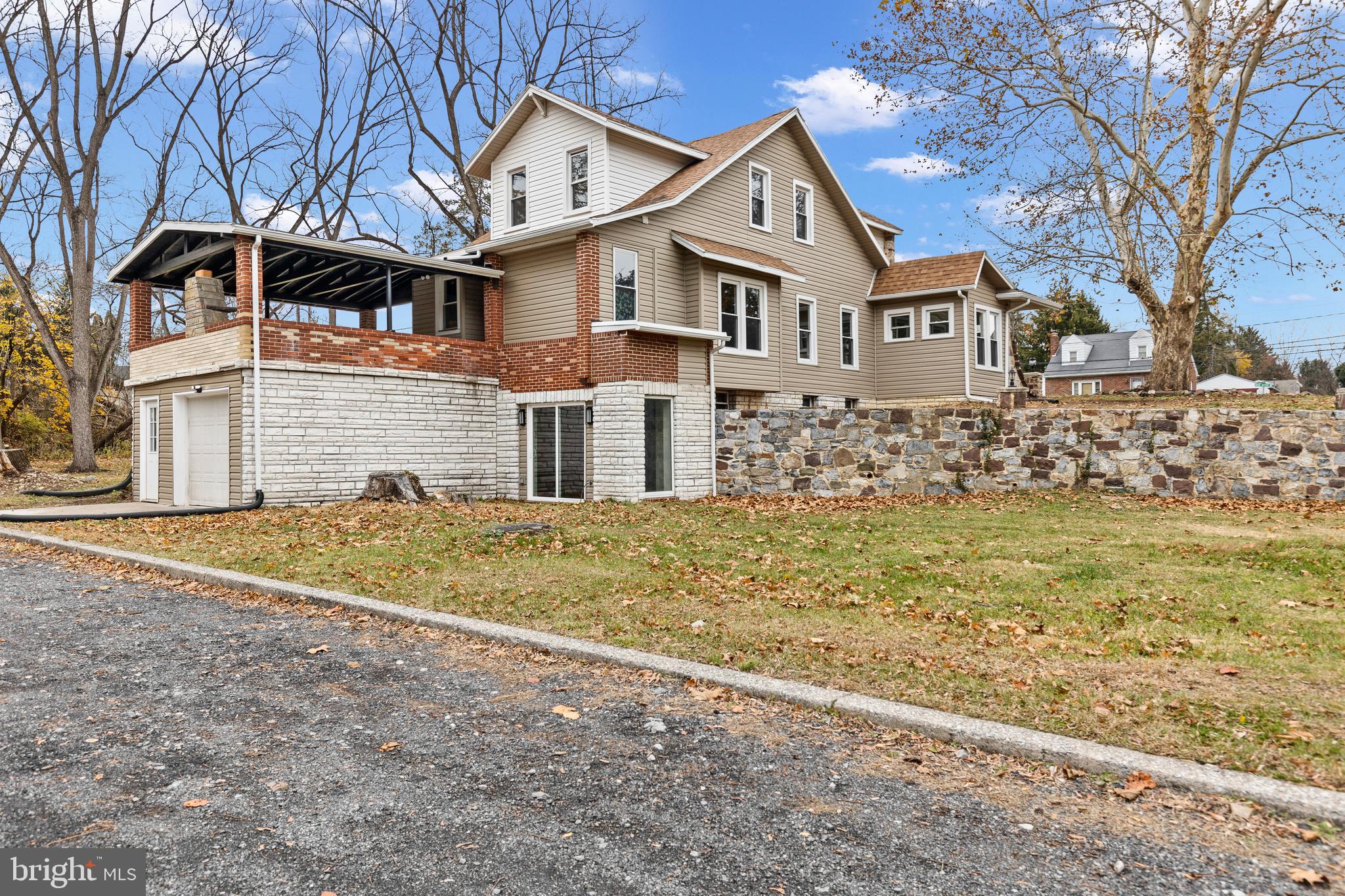 3507 Union Deposit Road Harrisburg, PA 17109 - Photo 33 of 37 a front view of a house with garden