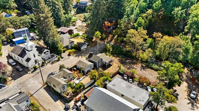 an aerial view of a city with lots of residential buildings