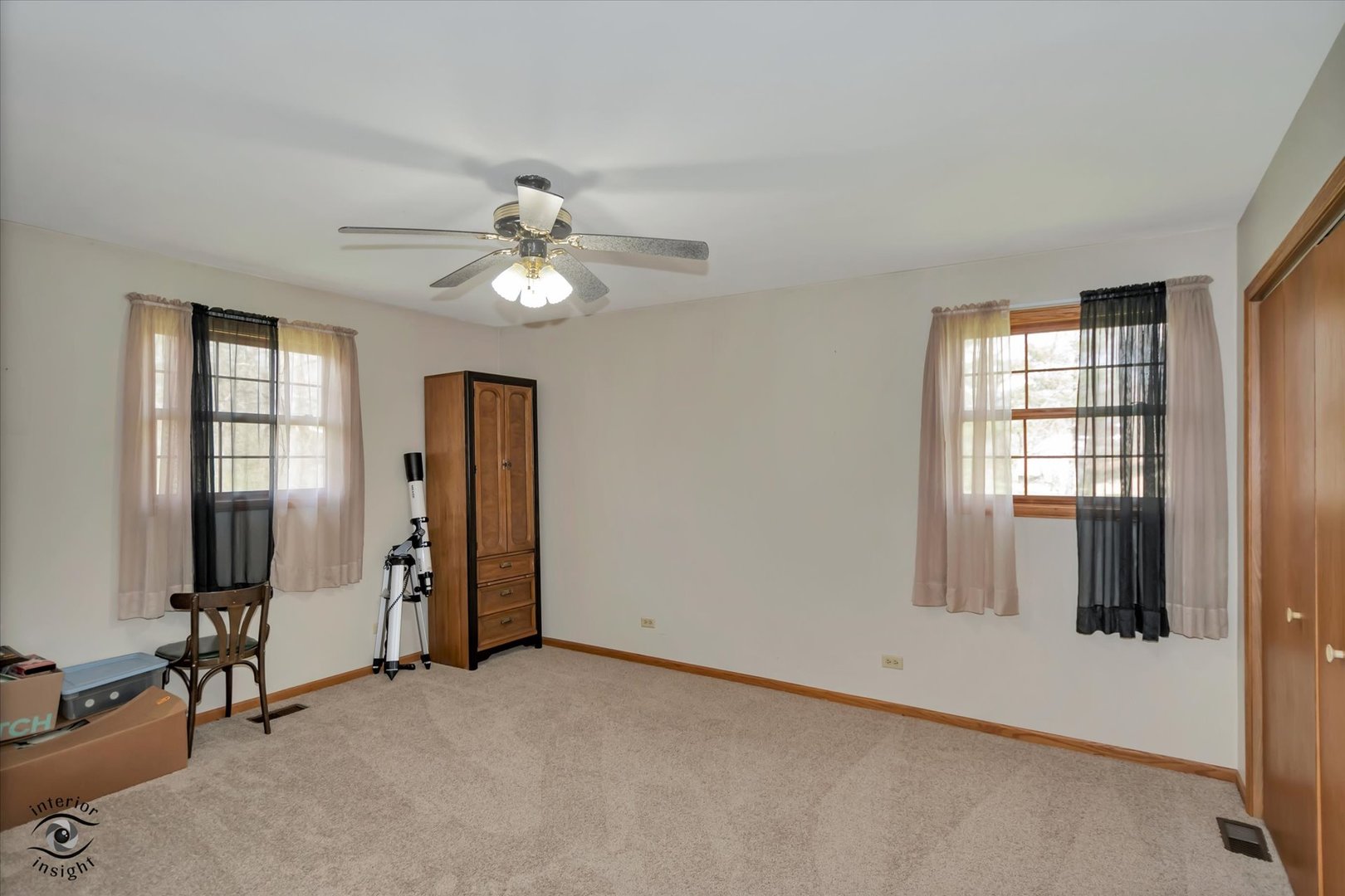24412 Kings Road Crete, IL 60417 - Photo 11 of 28 an empty room with windows and closet