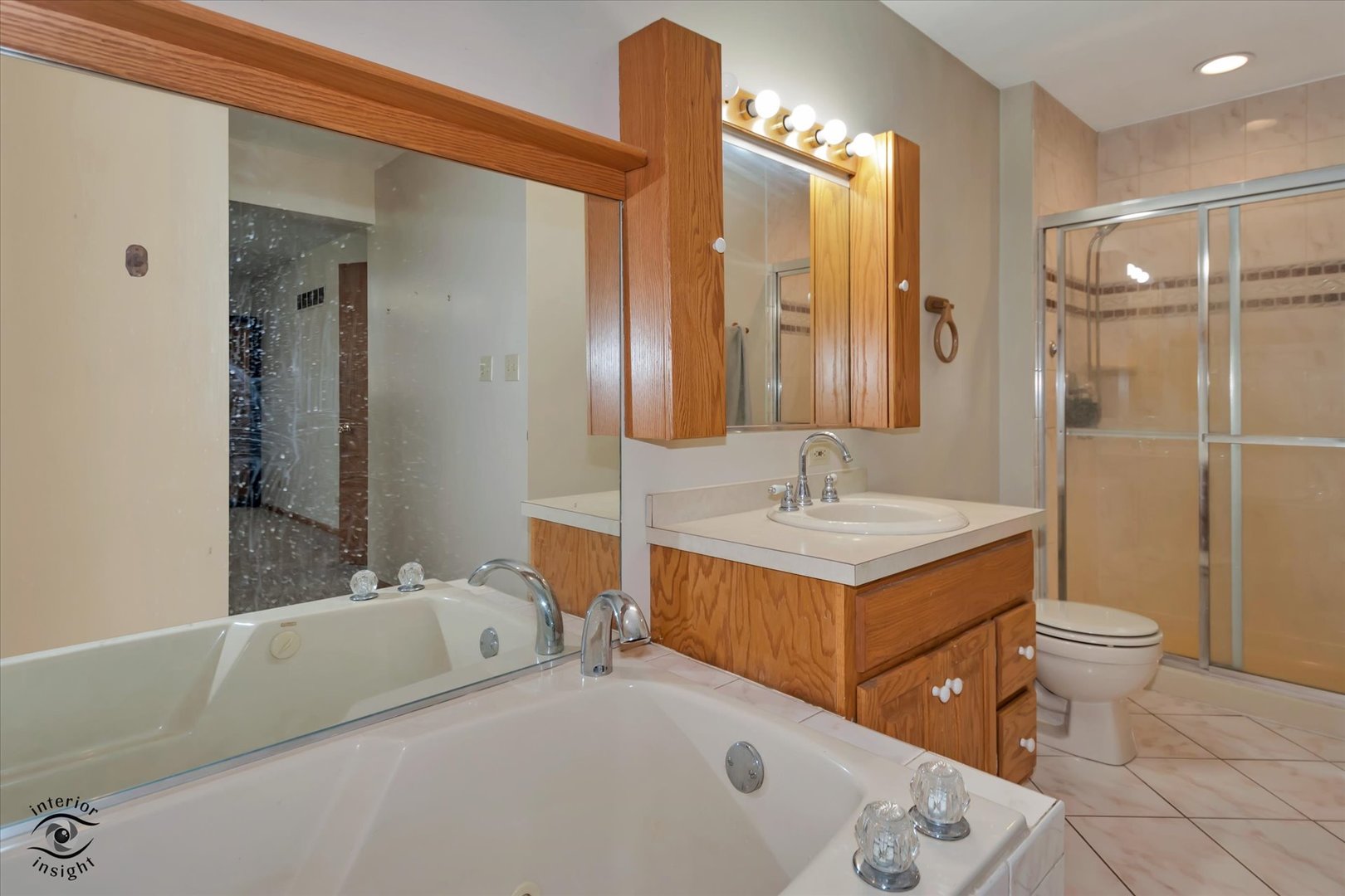 24412 Kings Road Crete, IL 60417 - Photo 12 of 28 a bathroom with a sink and a mirror