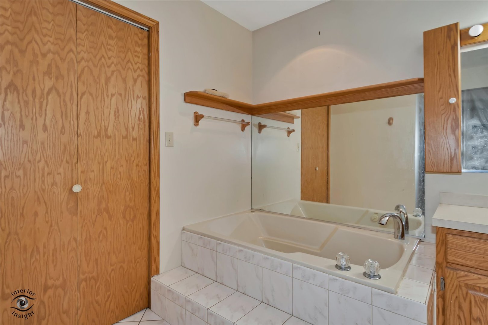 24412 Kings Road Crete, IL 60417 - Photo 13 of 28 a bathroom with a tub shower and sink
