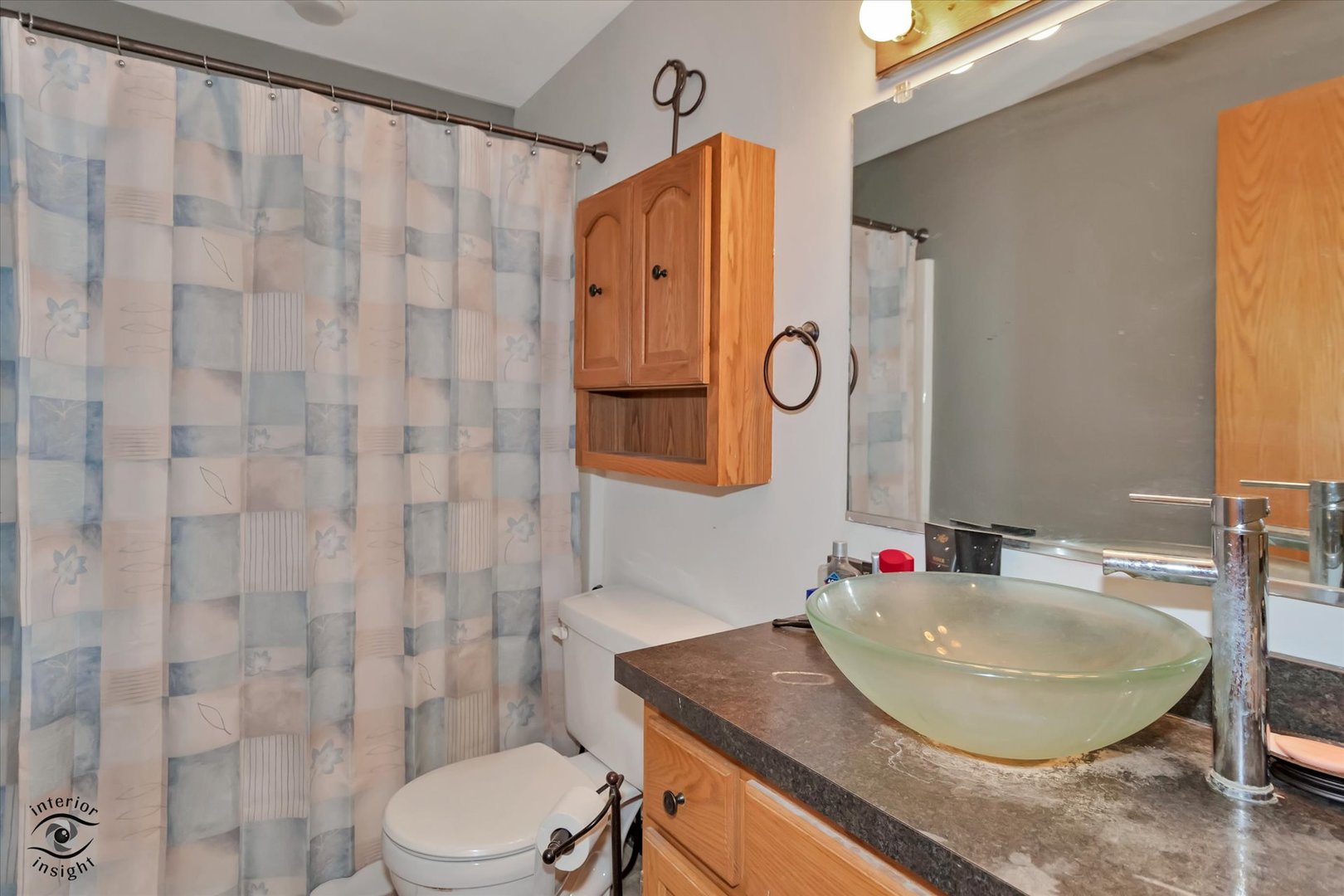 24412 Kings Road Crete, IL 60417 - Photo 22 of 28 a bathroom with a sink toilet and shower