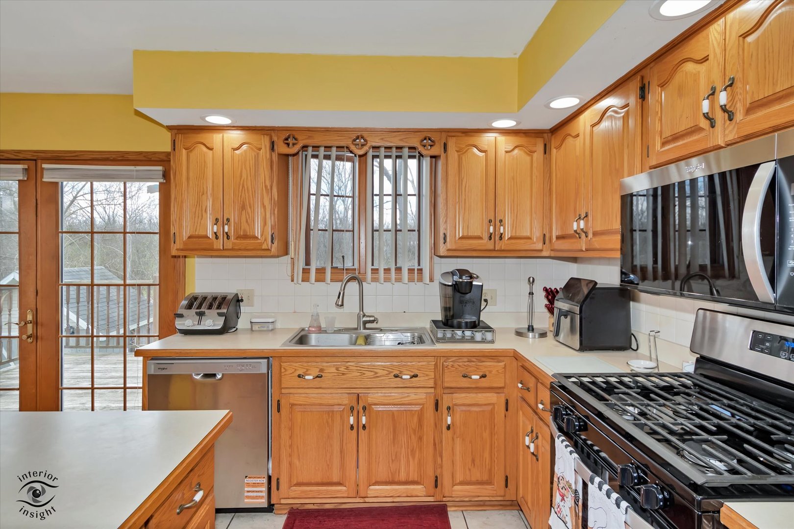 24412 Kings Road Crete, IL 60417 - Photo 8 of 28 a kitchen with a stove a sink and a microwave