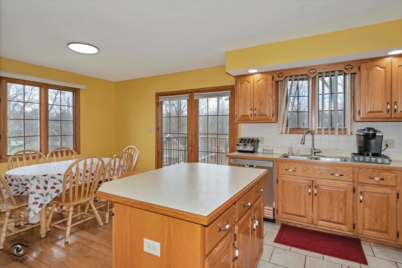 24412 Kings Road Crete, IL 60417 - Photo 9 of 28 a kitchen with a stove a sink and a refrigerator