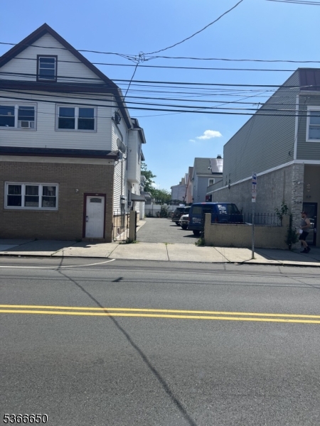 558 South Broad Street Elizabeth, NJ 07202 - Photo 3 of 4 a view of a house with a swimming pool