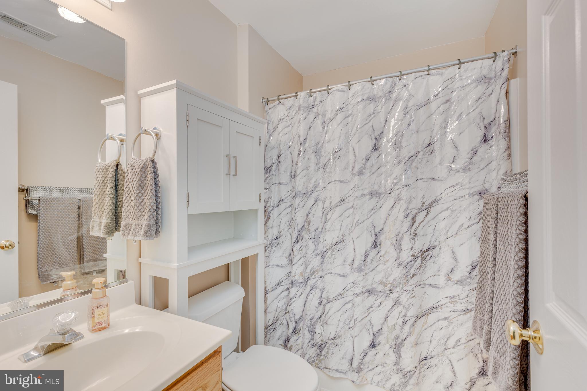 420 Tuckerton Road Medford, NJ 08055 - Photo 36 of 47 Elegant marble-patterned bathroom retreat.