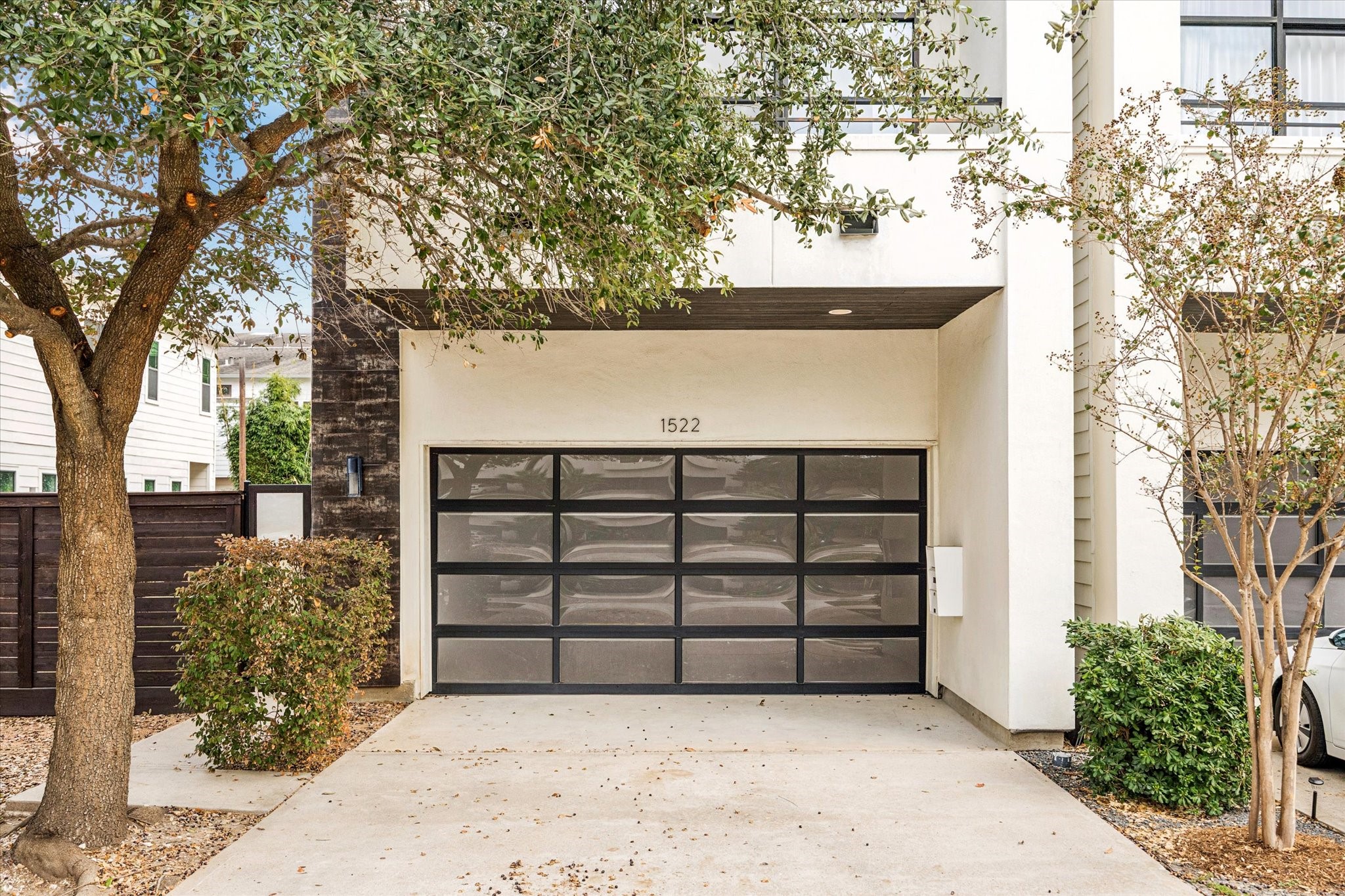 1522 Knox Street Houston, TX 77007 - Photo 1 of 43 front view of a house with a large tree