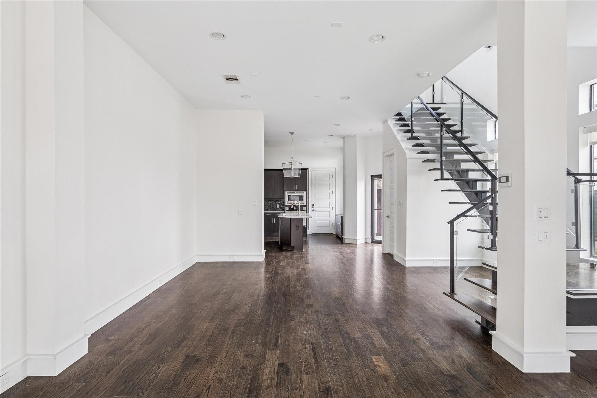 1522 Knox Street Houston, TX 77007 - Photo 34 of 43 a view of an entryway with wooden floor