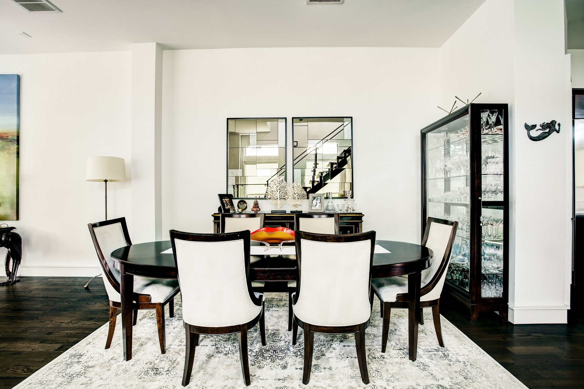 1522 Knox Street Houston, TX 77007 - Photo 4 of 43 a view of a dining room with furniture and wooden floor
