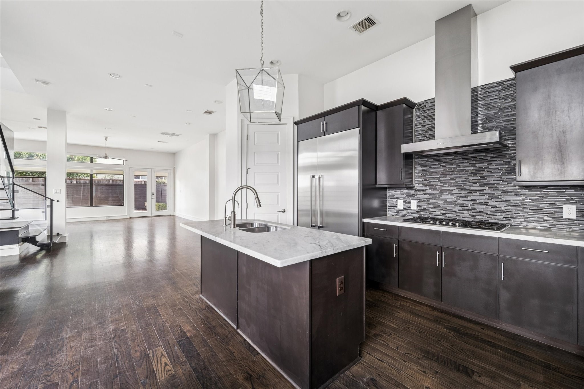 1522 Knox Street Houston, TX 77007 - Photo 10 of 43 a kitchen with stainless steel appliances granite countertop a sink a oven and a refrigerator