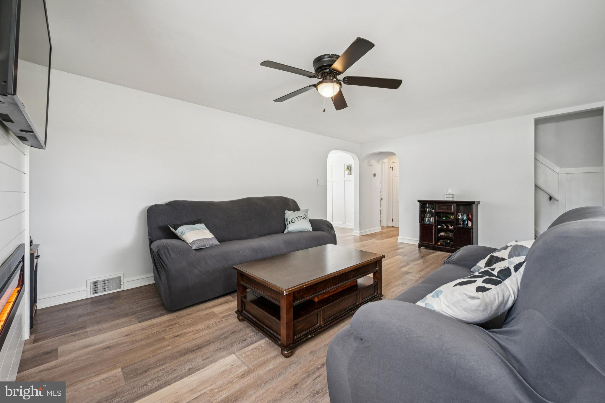 126 Repaupo Station Road Swedesboro, NJ 08085 - Photo 11 of 25 a living room with furniture and a wooden floor