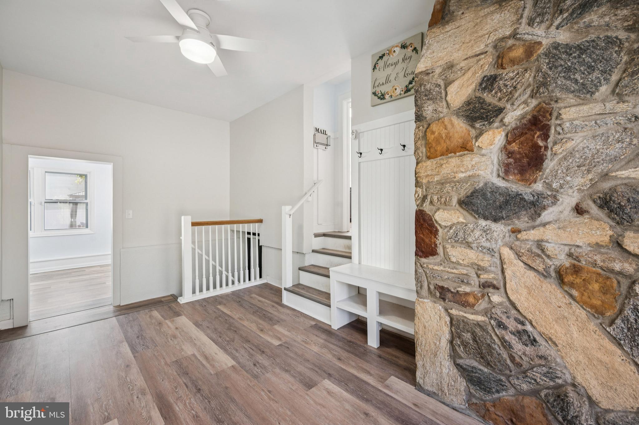 126 Repaupo Station Road Swedesboro, NJ 08085 - Photo 18 of 25 a view of a livingroom with wooden floor and white walls