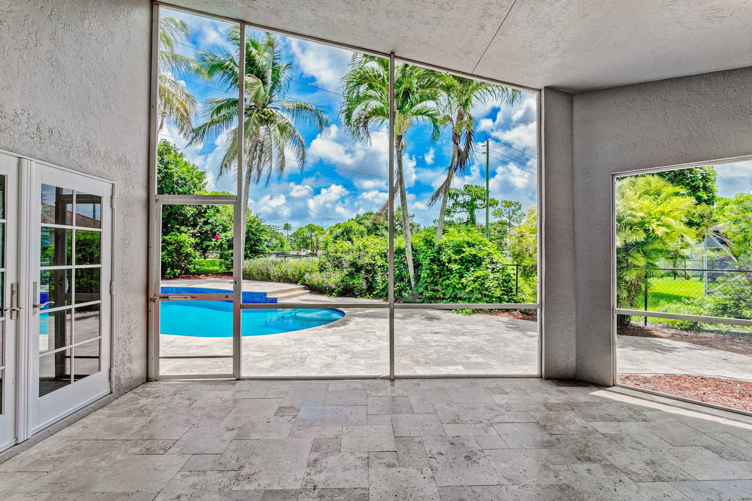 314 Hummingbird Point Jupiter, FL 33458 - Photo 45 of 71 Screened Back Patio
