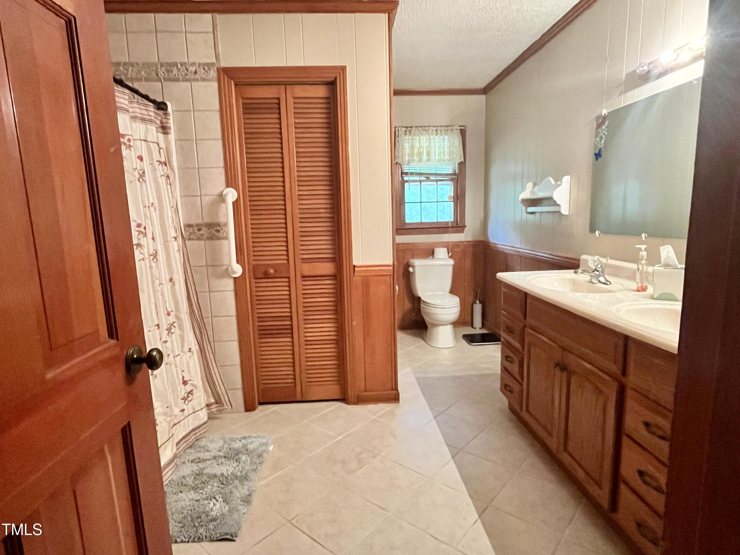 376 Hennings Drive Vass, NC 28394 - Photo 17 of 23 a bathroom with a sink a toilet and shower