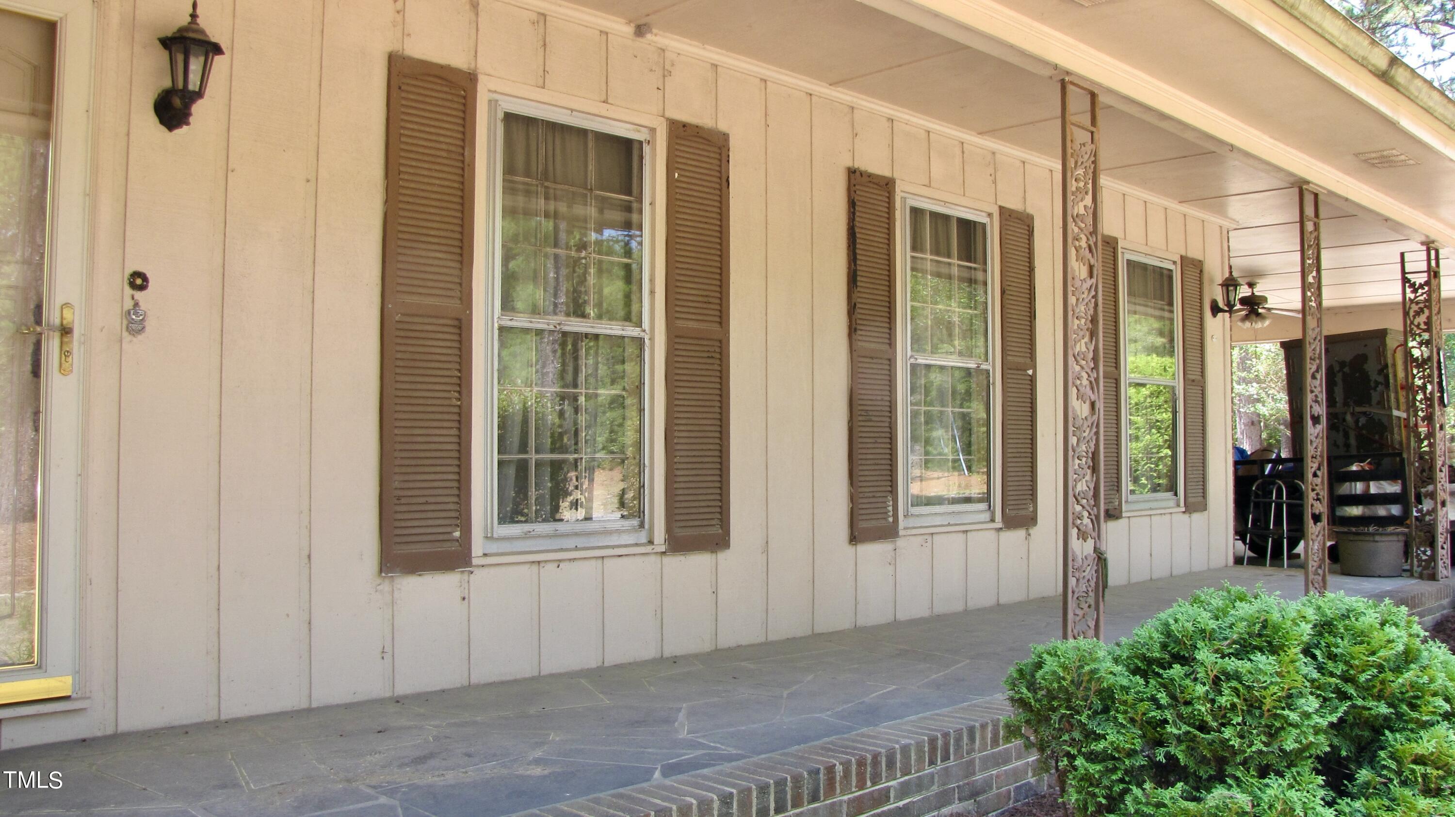 376 Hennings Drive Vass, NC 28394 - Photo 5 of 23 a view of a door with a glass door and a window