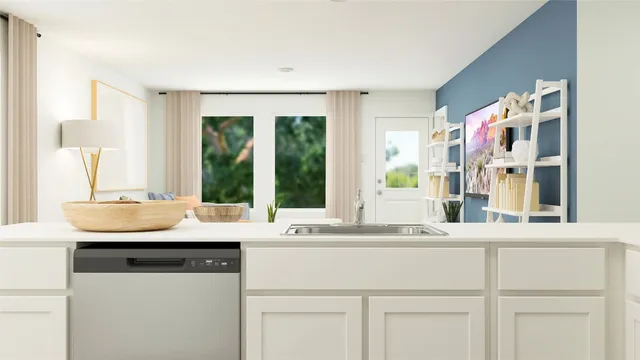 a kitchen with a sink and a window