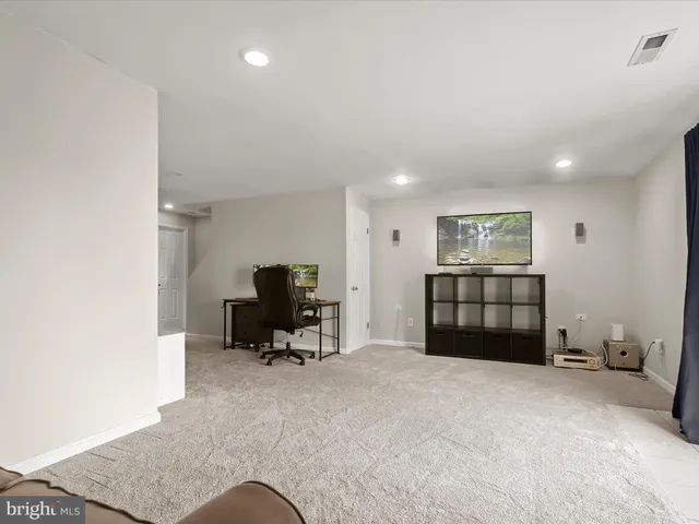 a workspace with furniture and a couch