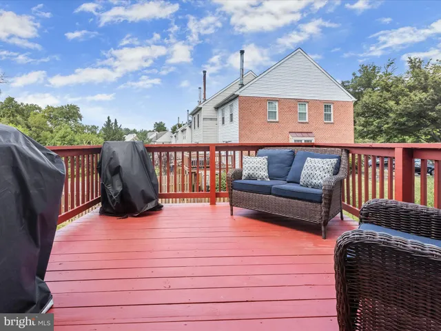 a view of a roof deck with couches