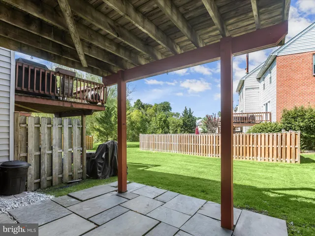 a view of a porch with a backyard