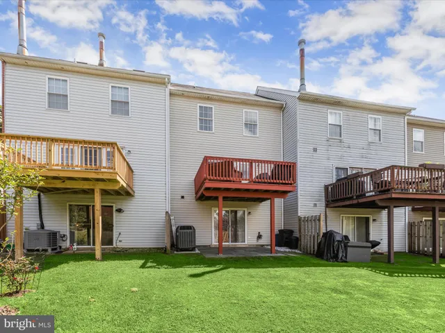 a view of a building with a yard