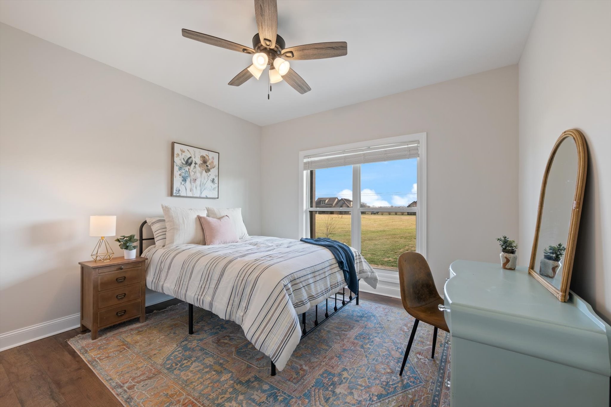 2057 Halls Mill Road Unionville, TN 37180 - Photo 17 of 36 a bedroom with a bed a chandelier and a dresser