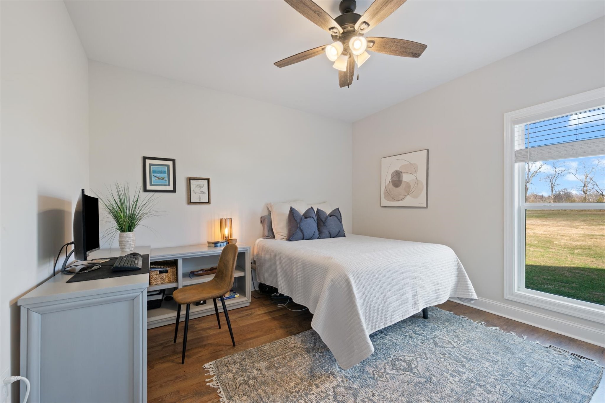 2057 Halls Mill Road Unionville, TN 37180 - Photo 18 of 36 a bedroom with a bed and a window