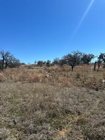 a view of mountain view with trees around