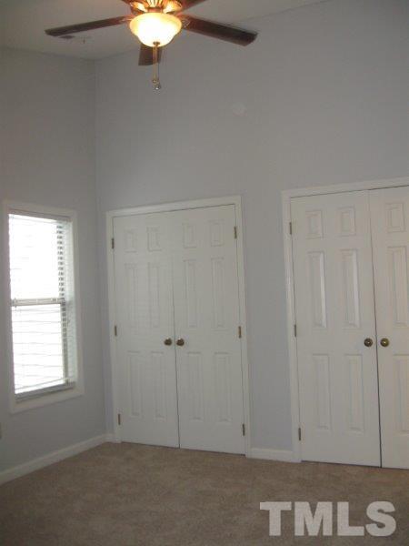 6111 Sunpointe Drive, Unit 201 Raleigh, NC 27606 - Photo 17 of 17 a view of an empty room with a window