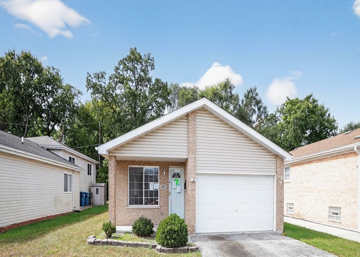 602 Merrill Avenue Calumet City, IL 60409 - Photo 3 of 22 a view of a house with a yard