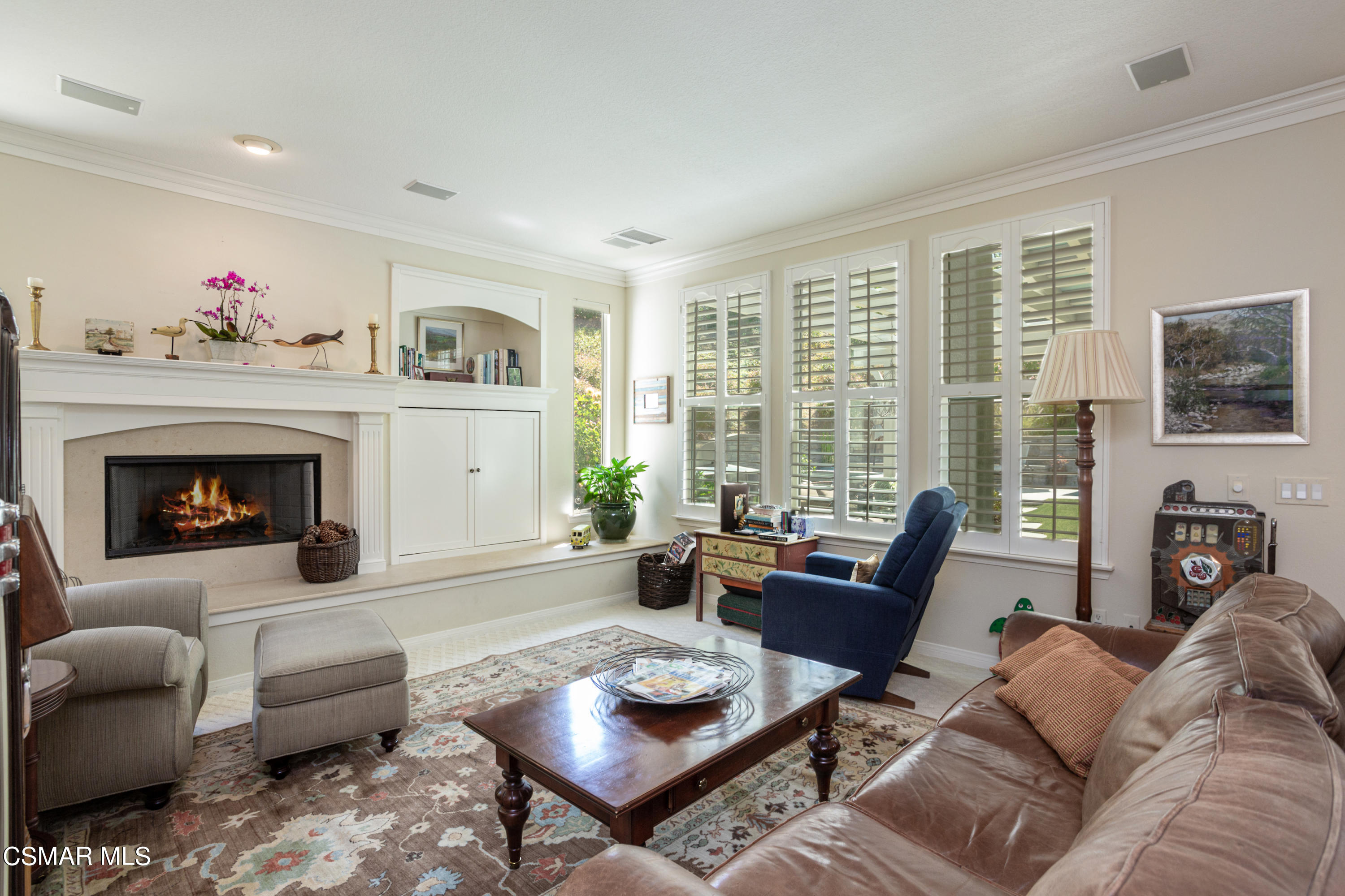 30 West Twisted Oak Drive Simi Valley, CA 93065 - Photo 16 of 45 a living room with furniture fireplace and a large window
