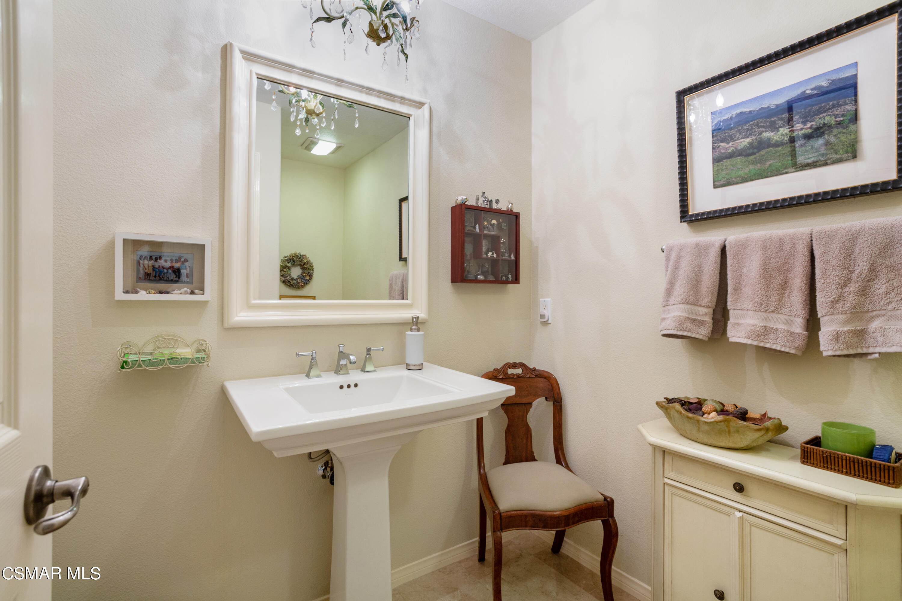 30 West Twisted Oak Drive Simi Valley, CA 93065 - Photo 17 of 45 a bathroom with a sink and a mirror