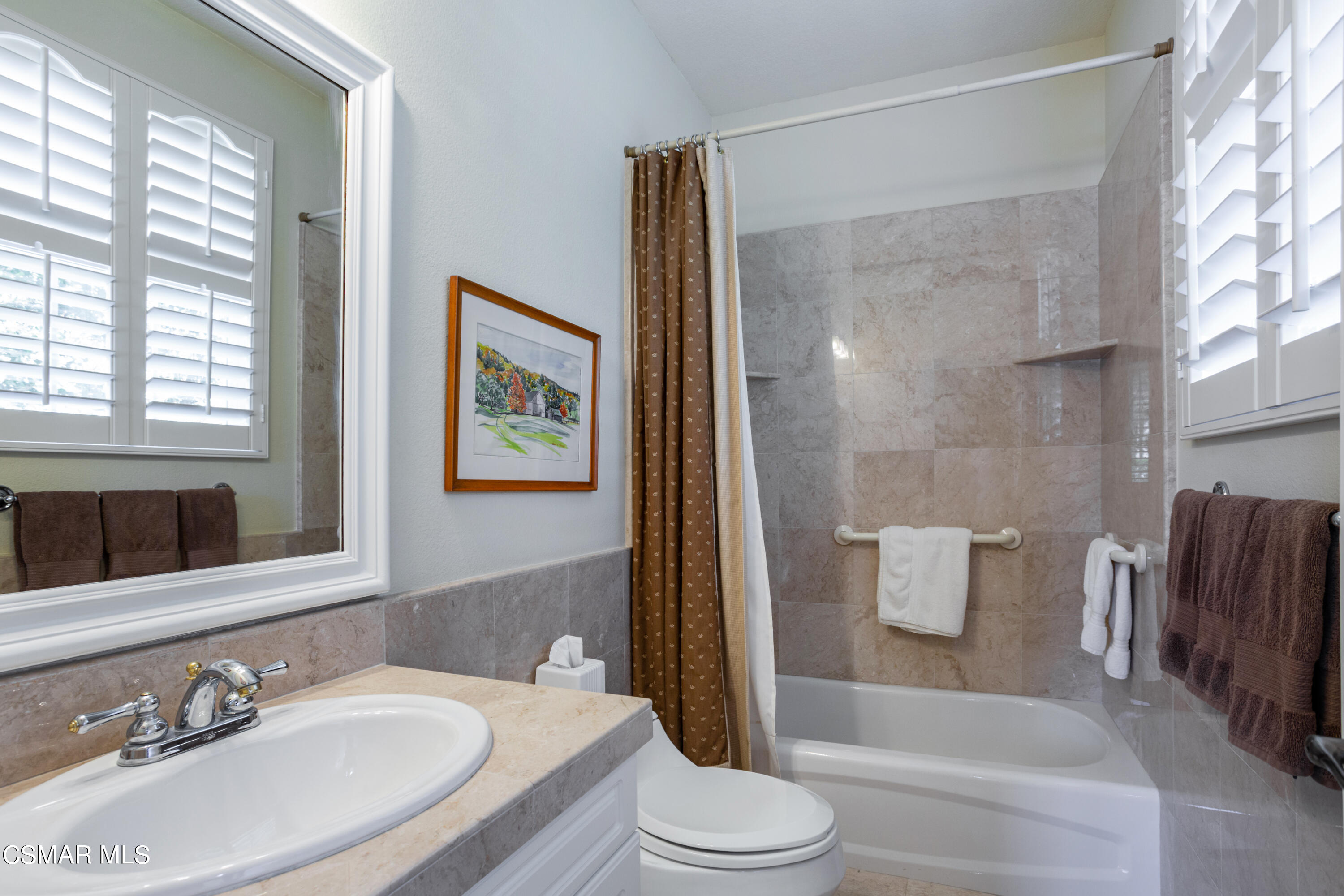 30 West Twisted Oak Drive Simi Valley, CA 93065 - Photo 19 of 45 a bathroom with a sink a toilet and shower