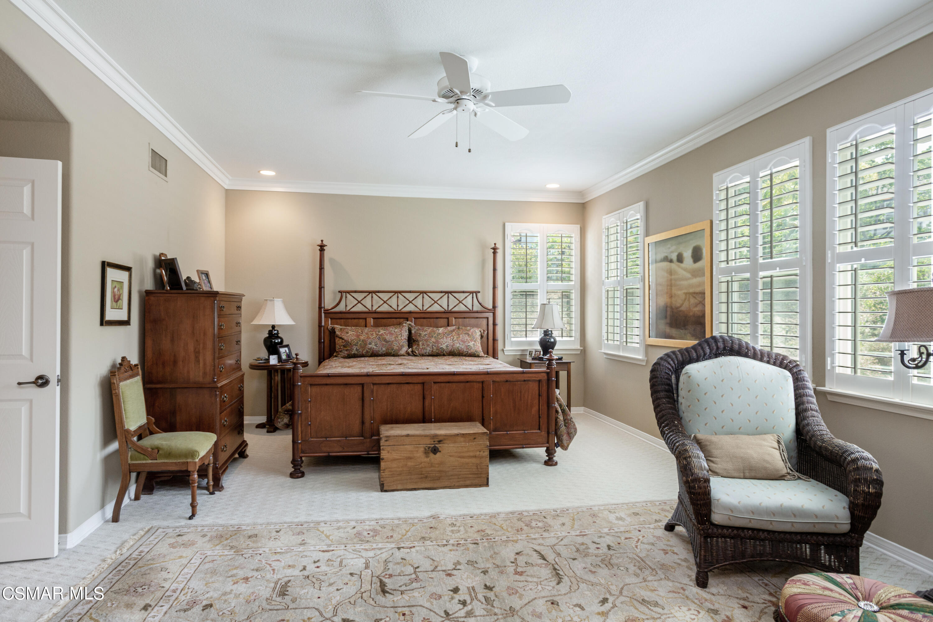 30 West Twisted Oak Drive Simi Valley, CA 93065 - Photo 20 of 45 a bedroom with a bed and a couch
