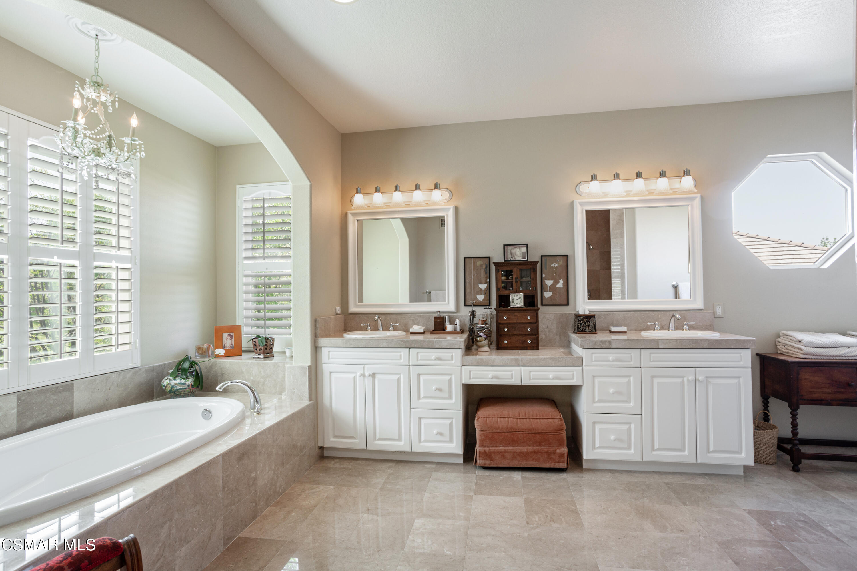 30 West Twisted Oak Drive Simi Valley, CA 93065 - Photo 22 of 45 a spacious bathroom with a granite countertop tub sink and mirror