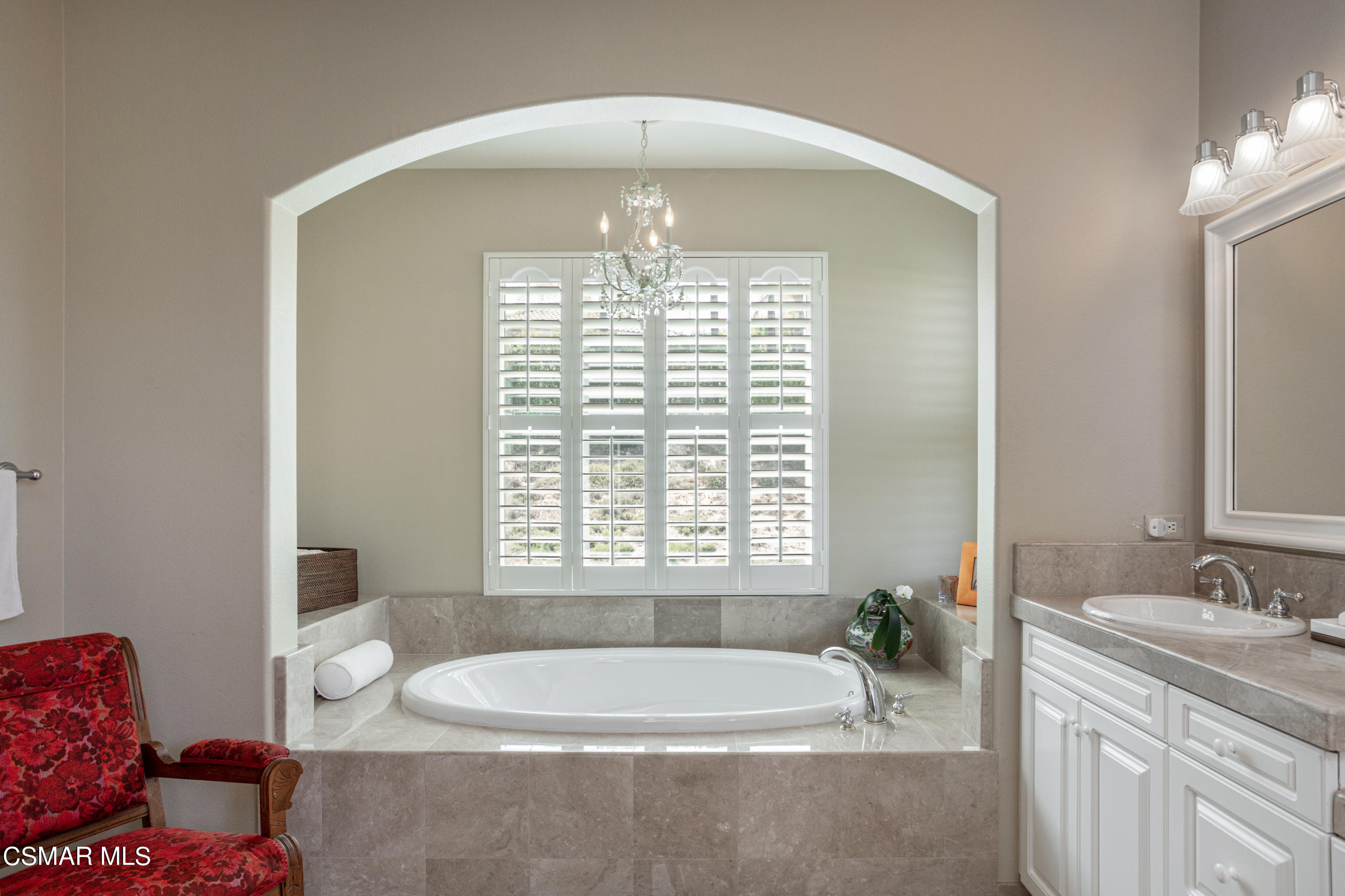 30 West Twisted Oak Drive Simi Valley, CA 93065 - Photo 23 of 45 a spacious bathroom with a tub sink and mirror