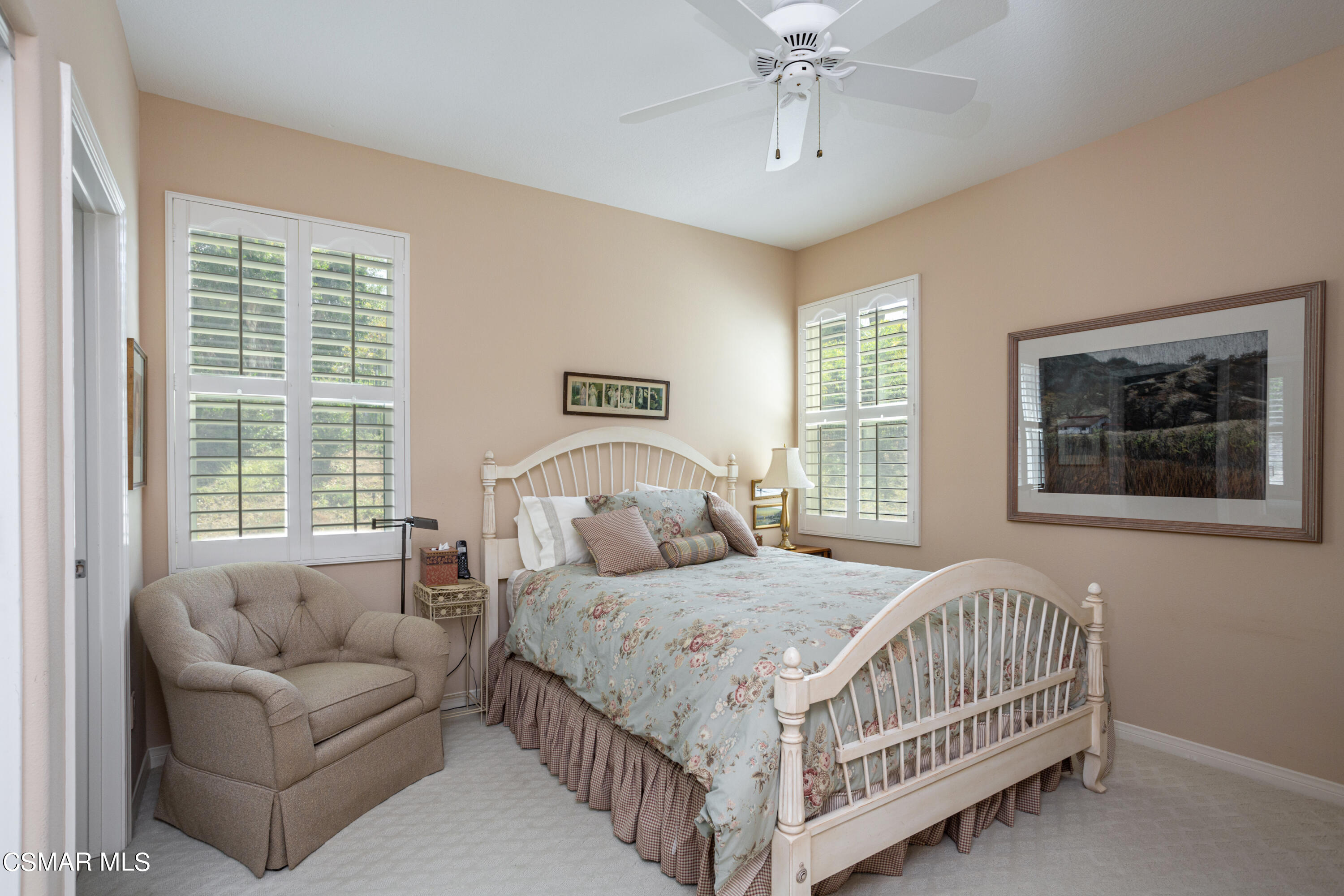 30 West Twisted Oak Drive Simi Valley, CA 93065 - Photo 26 of 45 a bedroom with a bed and a couch